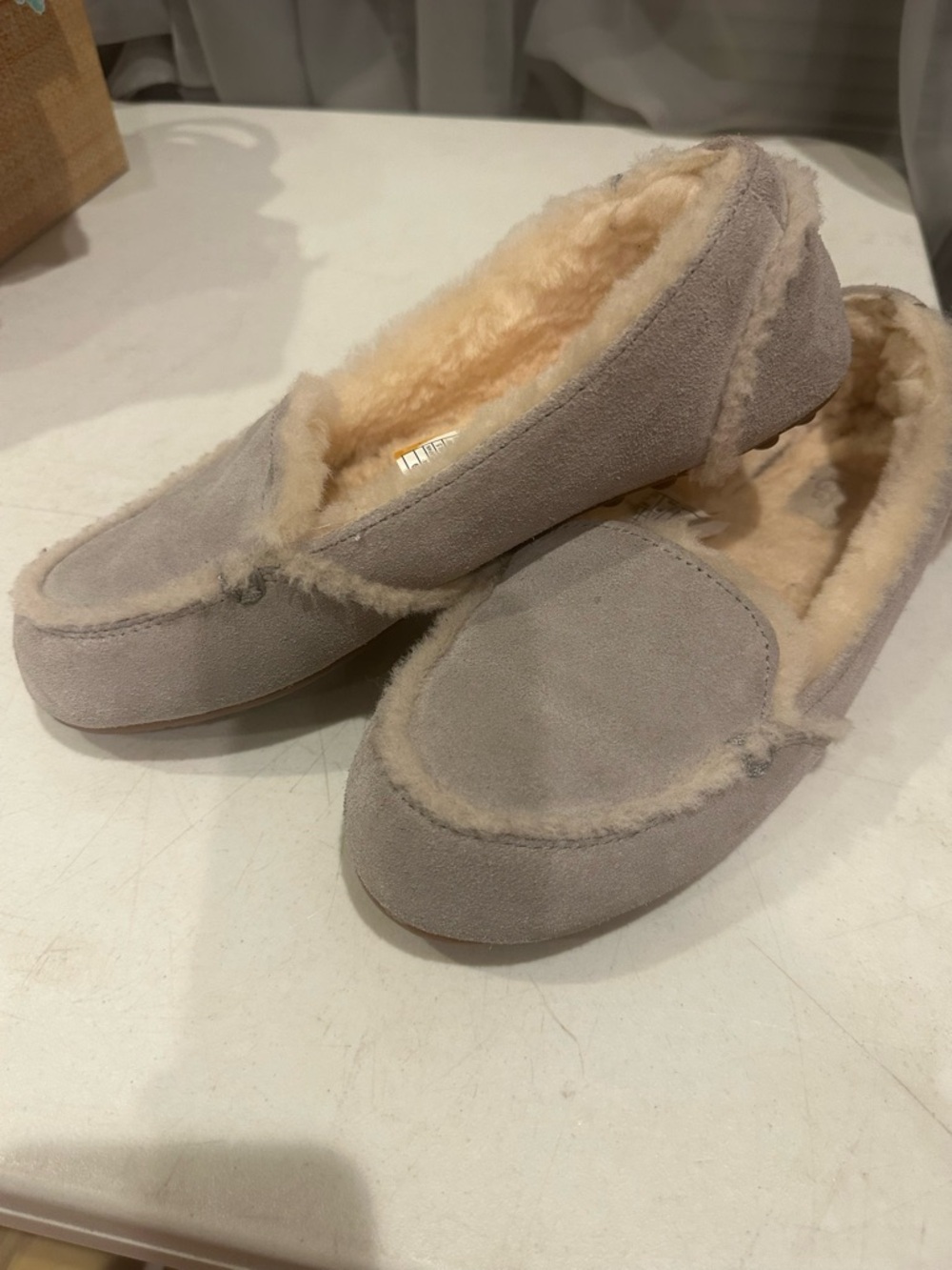 UGG Women's Suede Moccasin Slippers in Light Gray with Shearling Lining